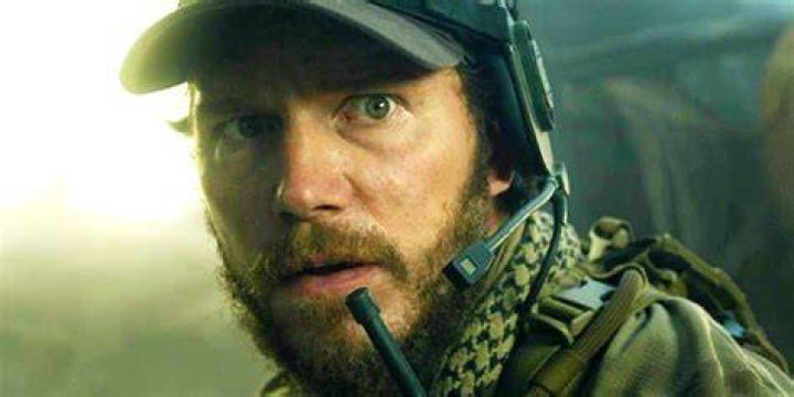 Chris Pratt as James Reece and Taylor Kitsch as Ben Edwards talk on a boat in The Terminal List